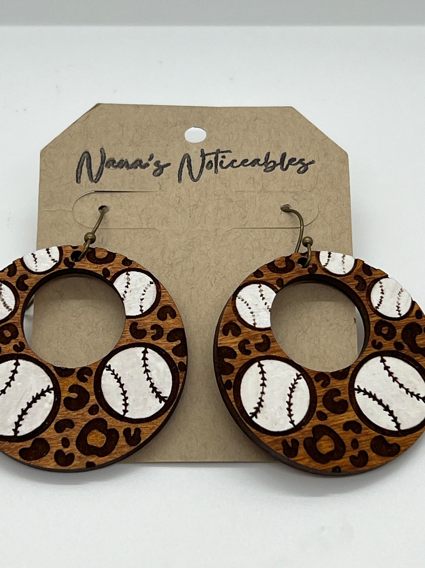 WOOD STAINED & PAINTED LEOPARD & BASEBALLS