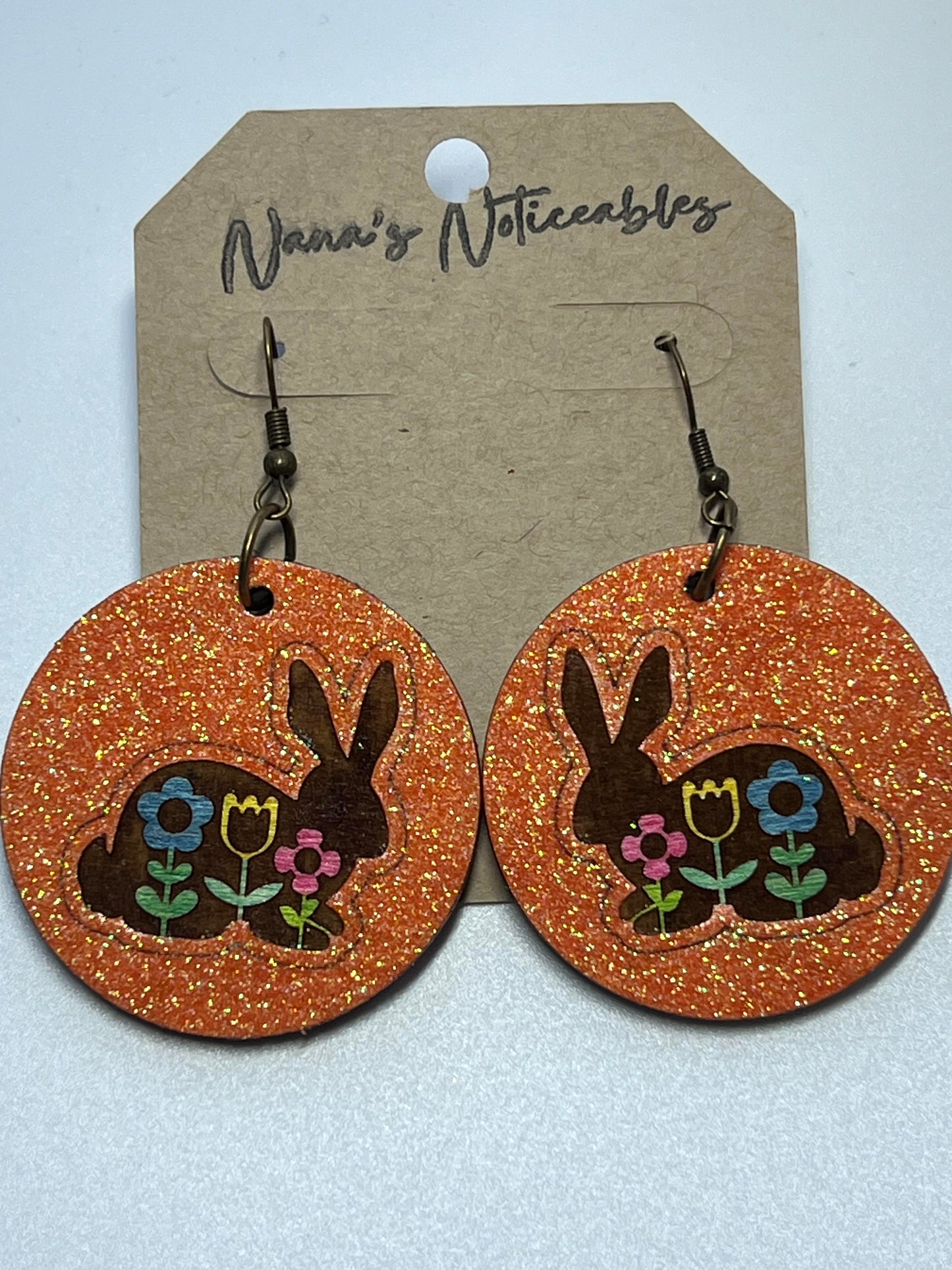 WOOD ROUND BUNNIES WITH FLOWERS IN GLITTER COLORS