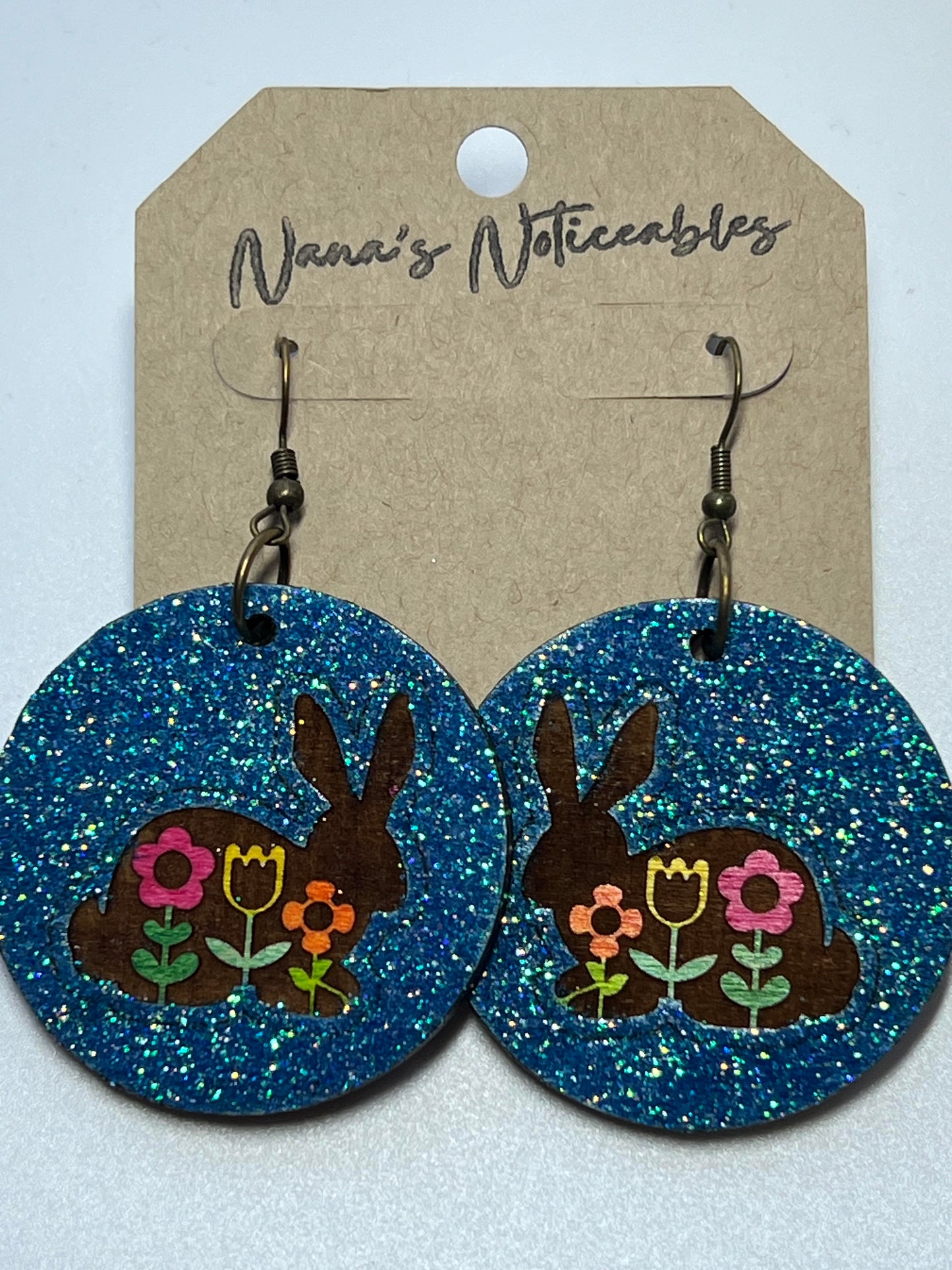 WOOD ROUND BUNNIES WITH FLOWERS IN GLITTER COLORS