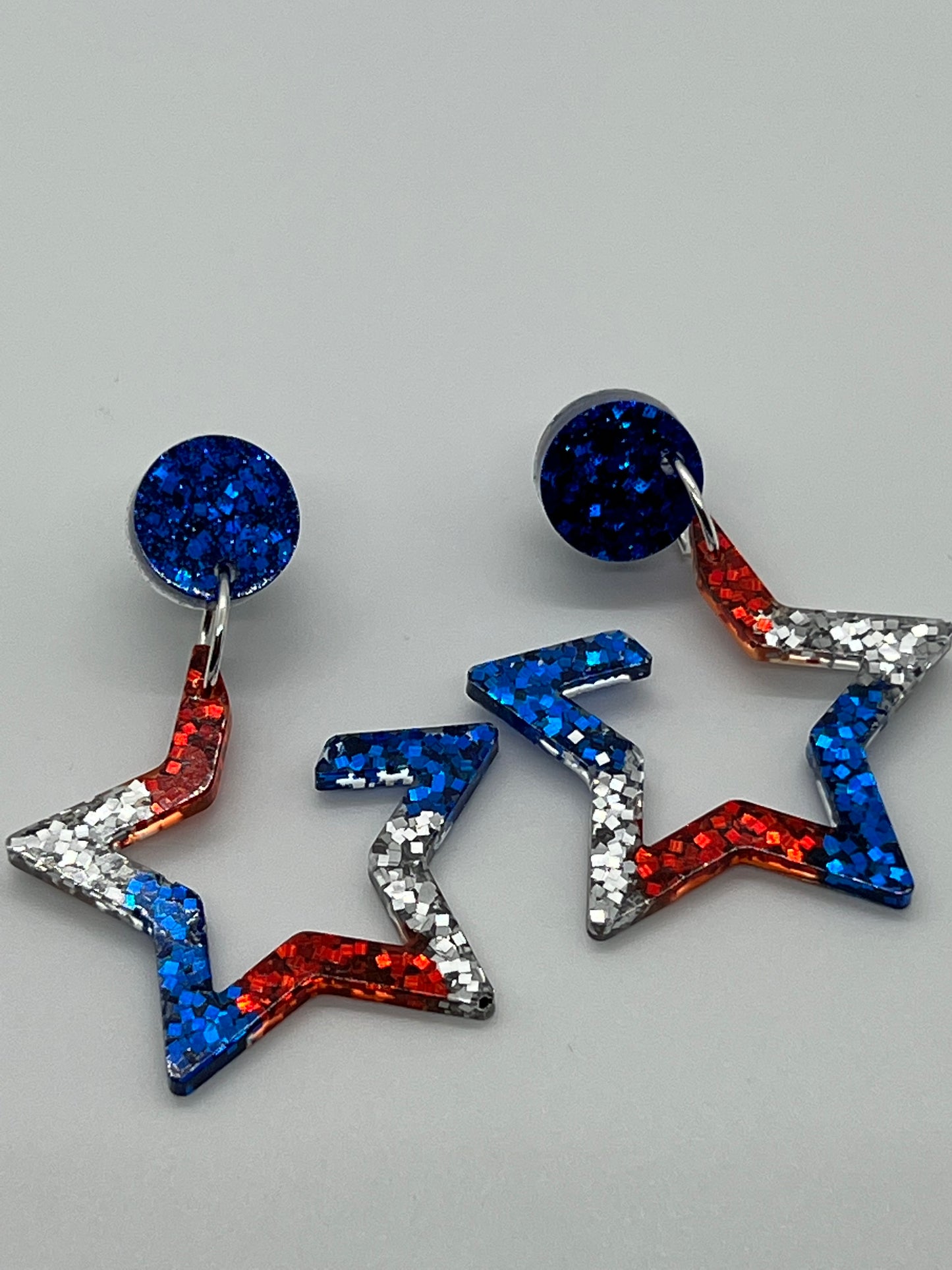 RESIN STAR WITH CIRCLE POST IN RED,WHITE & BLUE GLITTER