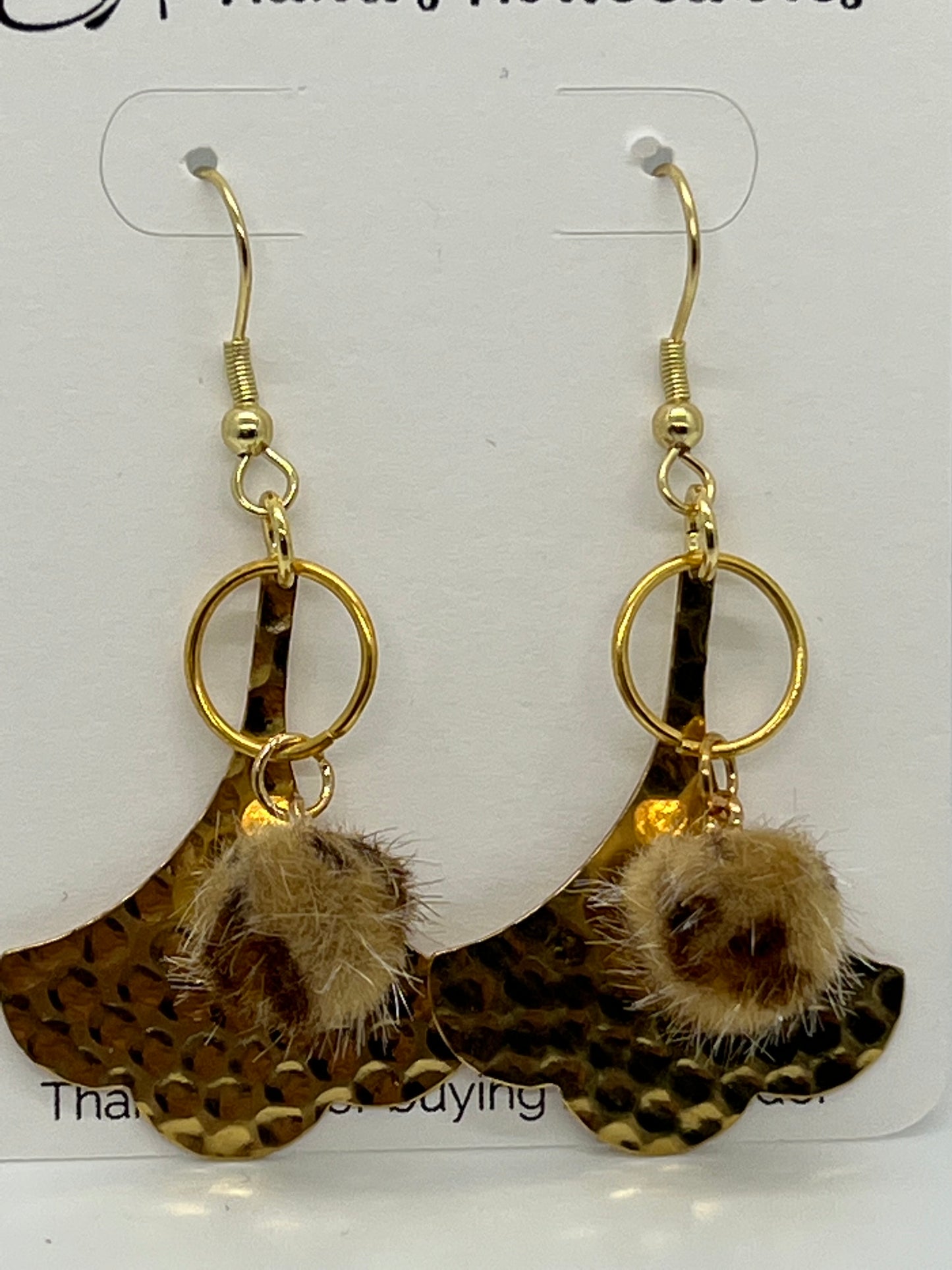 UNIQUELY METAL HAMMERED DROP EARRINGS WITH A LEOPARD FUZz BALL