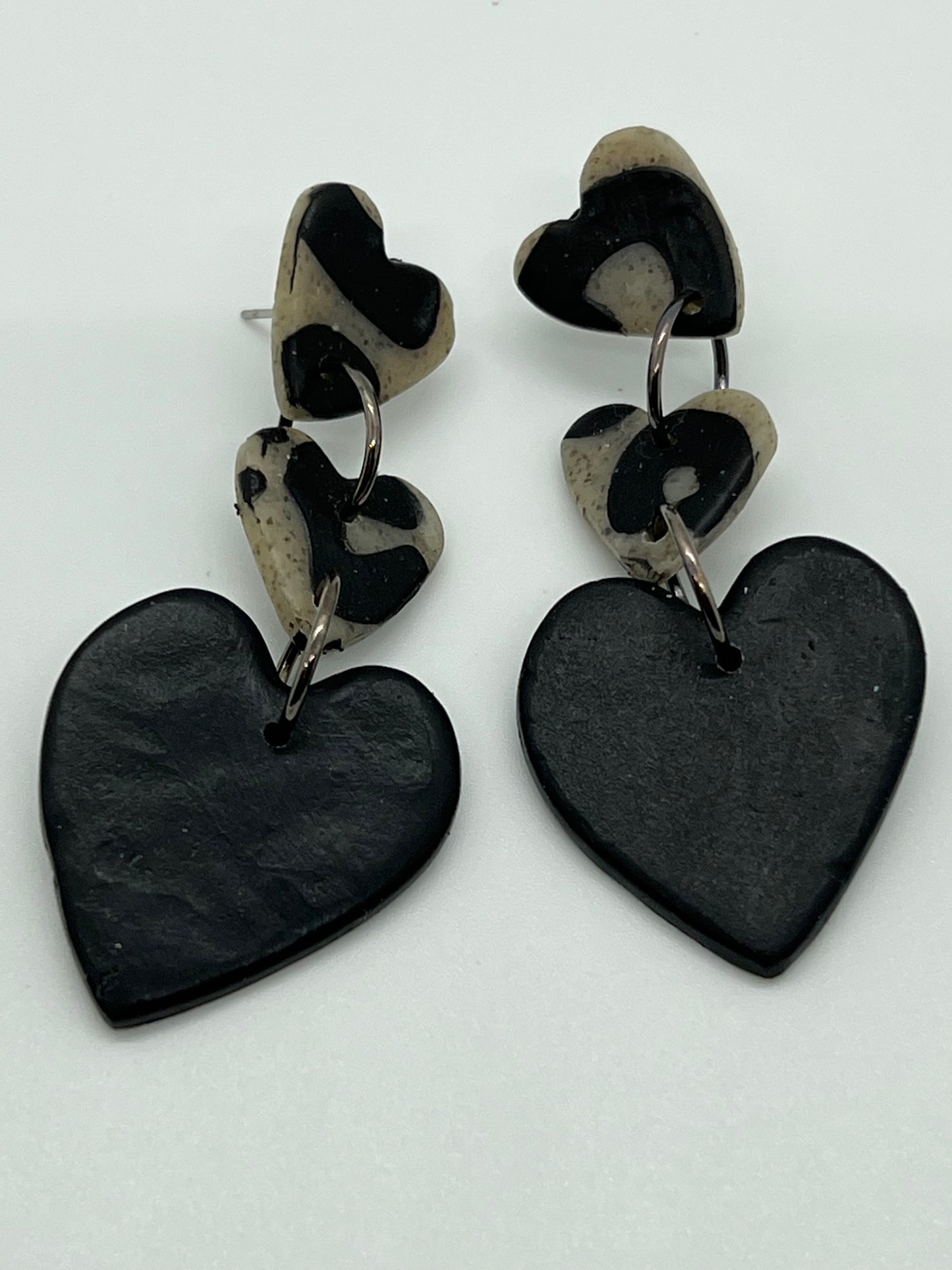 POLYMER 3 TIER HEARTS IN BLACK, GRANITE WITH BLACK PAINT IN LEOPARD PRINT