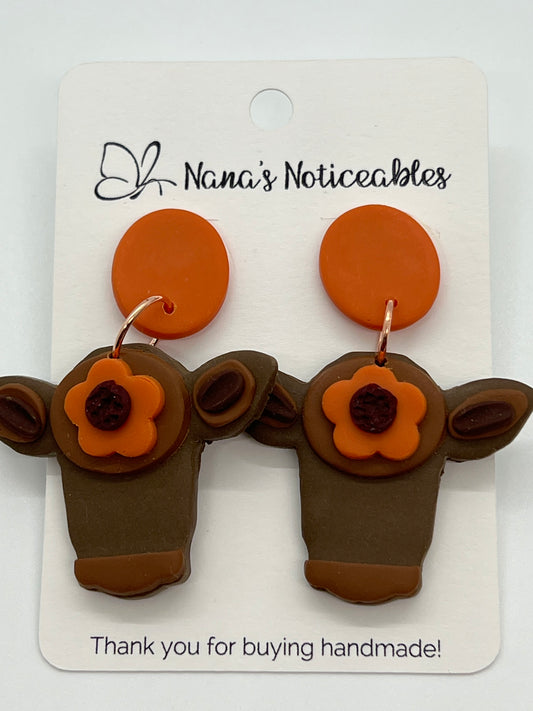 POLYMER COWS IN BROWN AND ORANGE