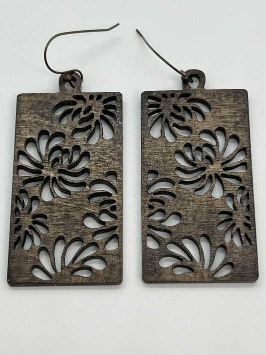 WOOD RECTANGLE WITH CUT OUT FLOWERS STAINED IN ANTIQUE BROWN