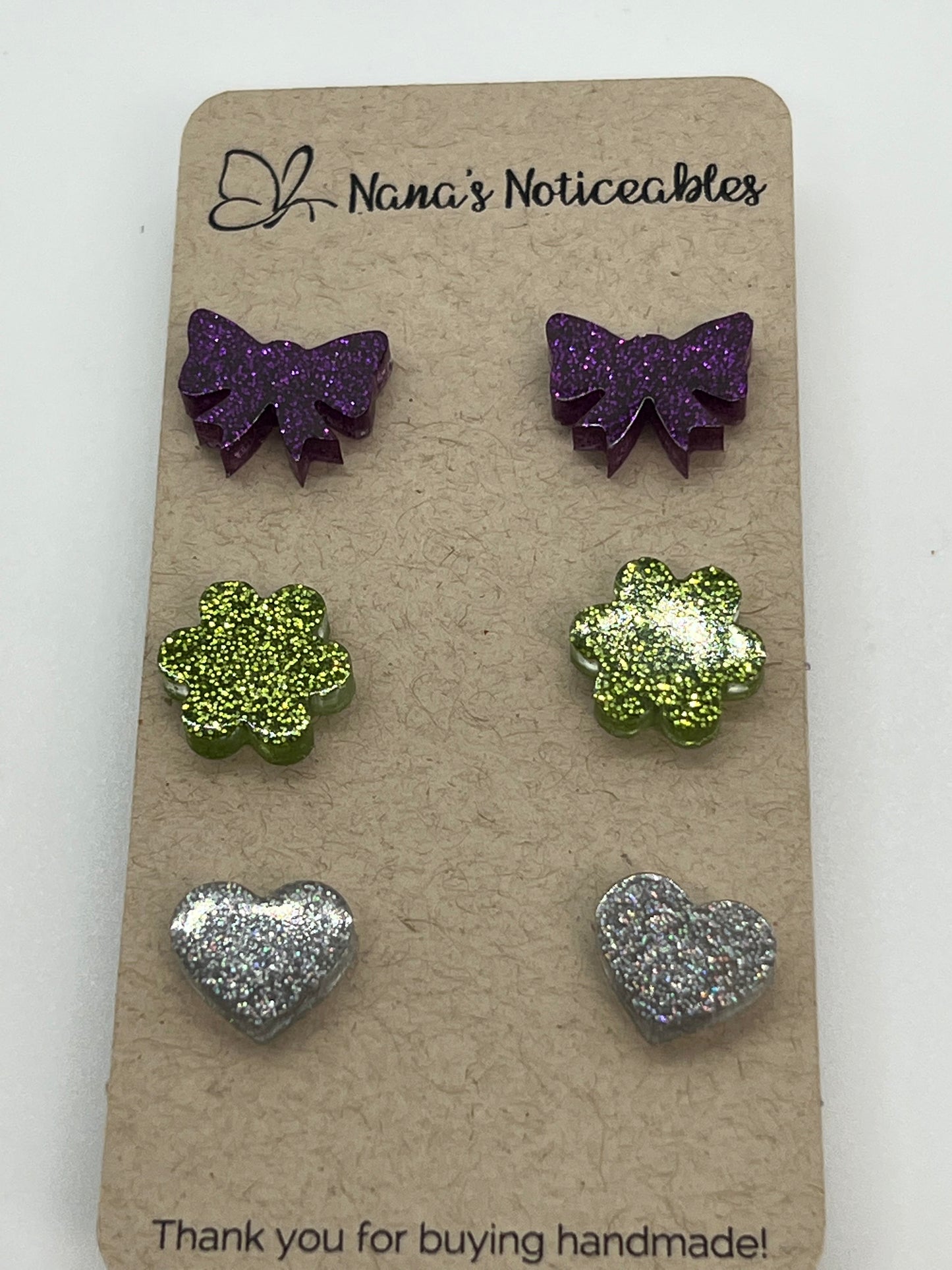 RESIN 3 PACK OF GLITTER POST PURPLE BOW, GREEN FLOWER AND MULTI SILVER HEART