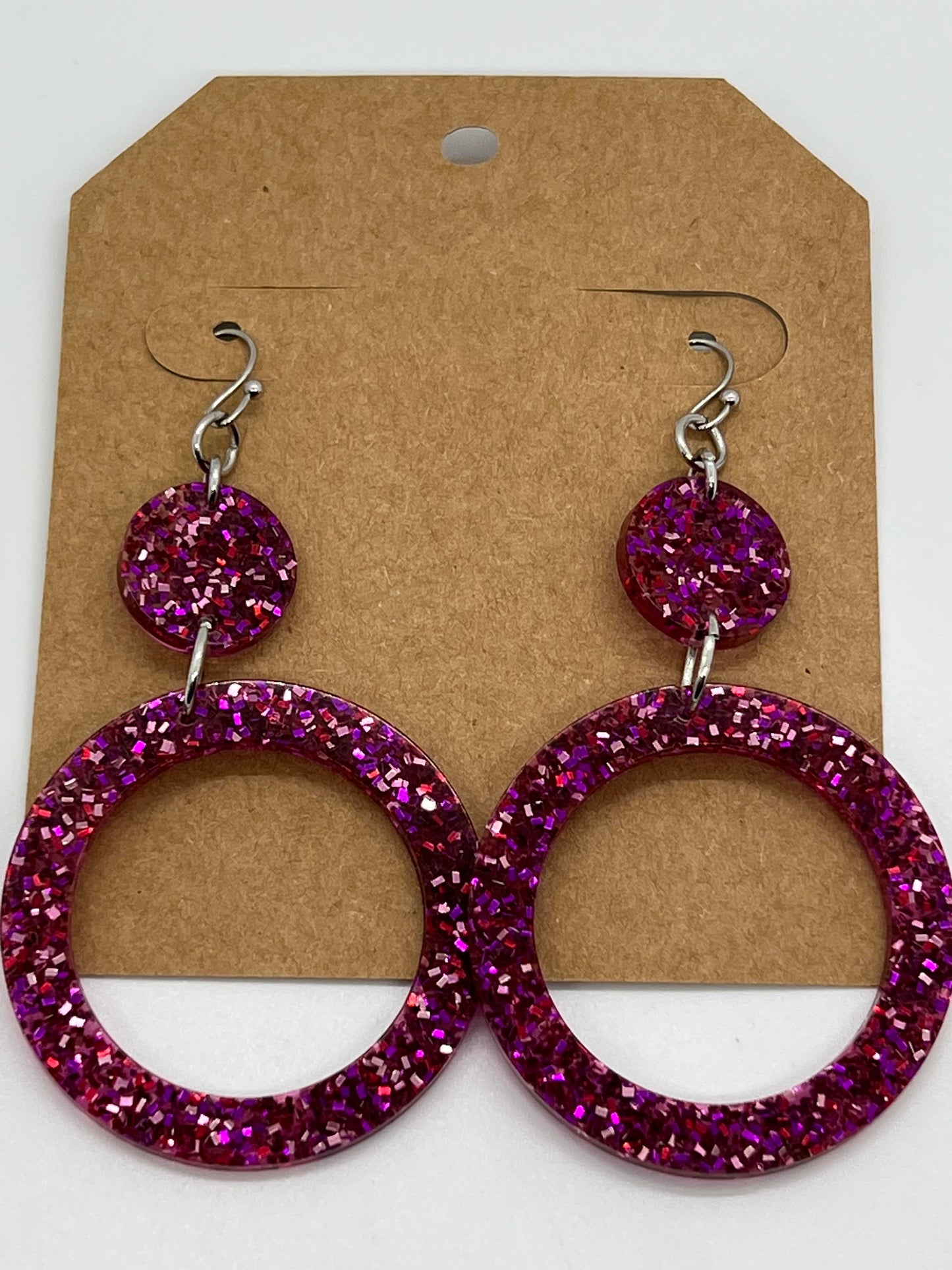 RESIN OPEN CIRCLE IN SPARKLE PINKS, RED AND PURPLE