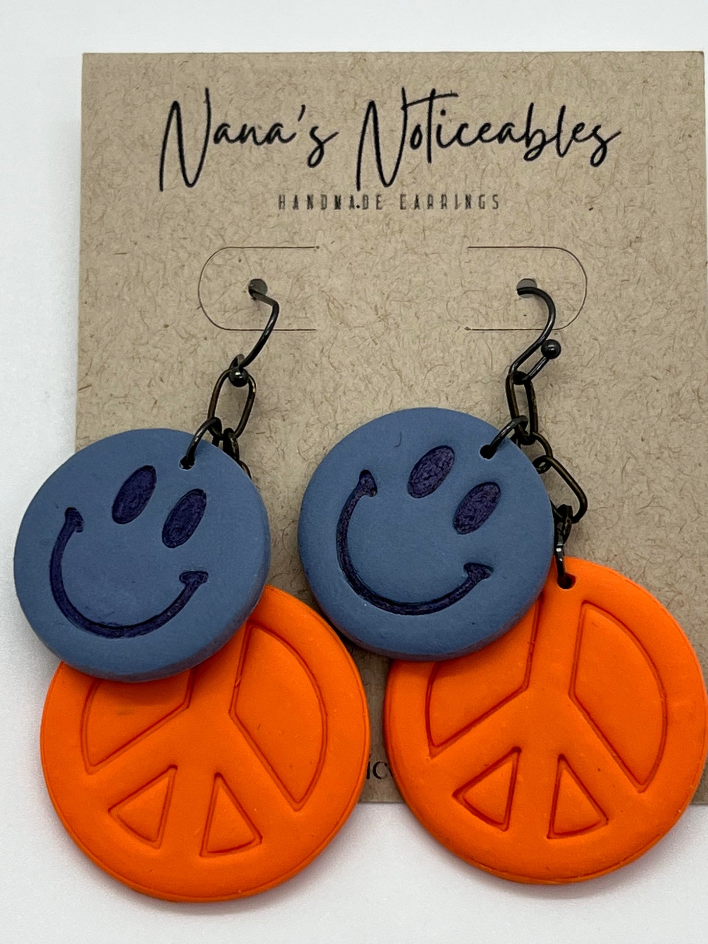 POLYMER MEDIUM BLUE SMILE FACE AND LARGE ORANGE PEACE SIGN